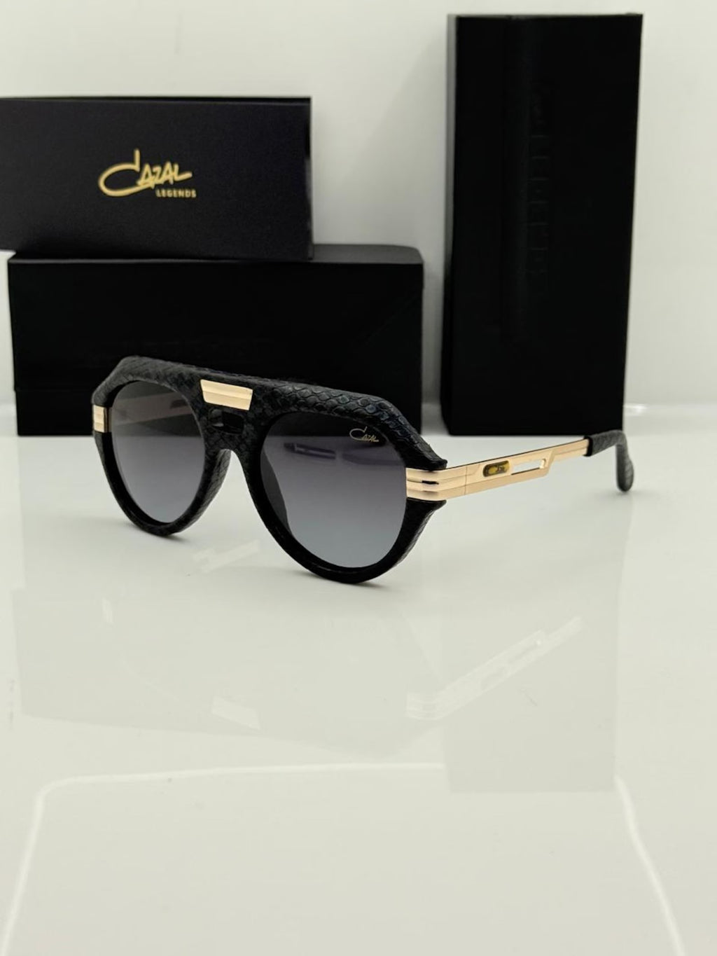 Cazal Glasses Legends 657 Black Leather Snakeskin Bridge Transparent Golden Sunglasses