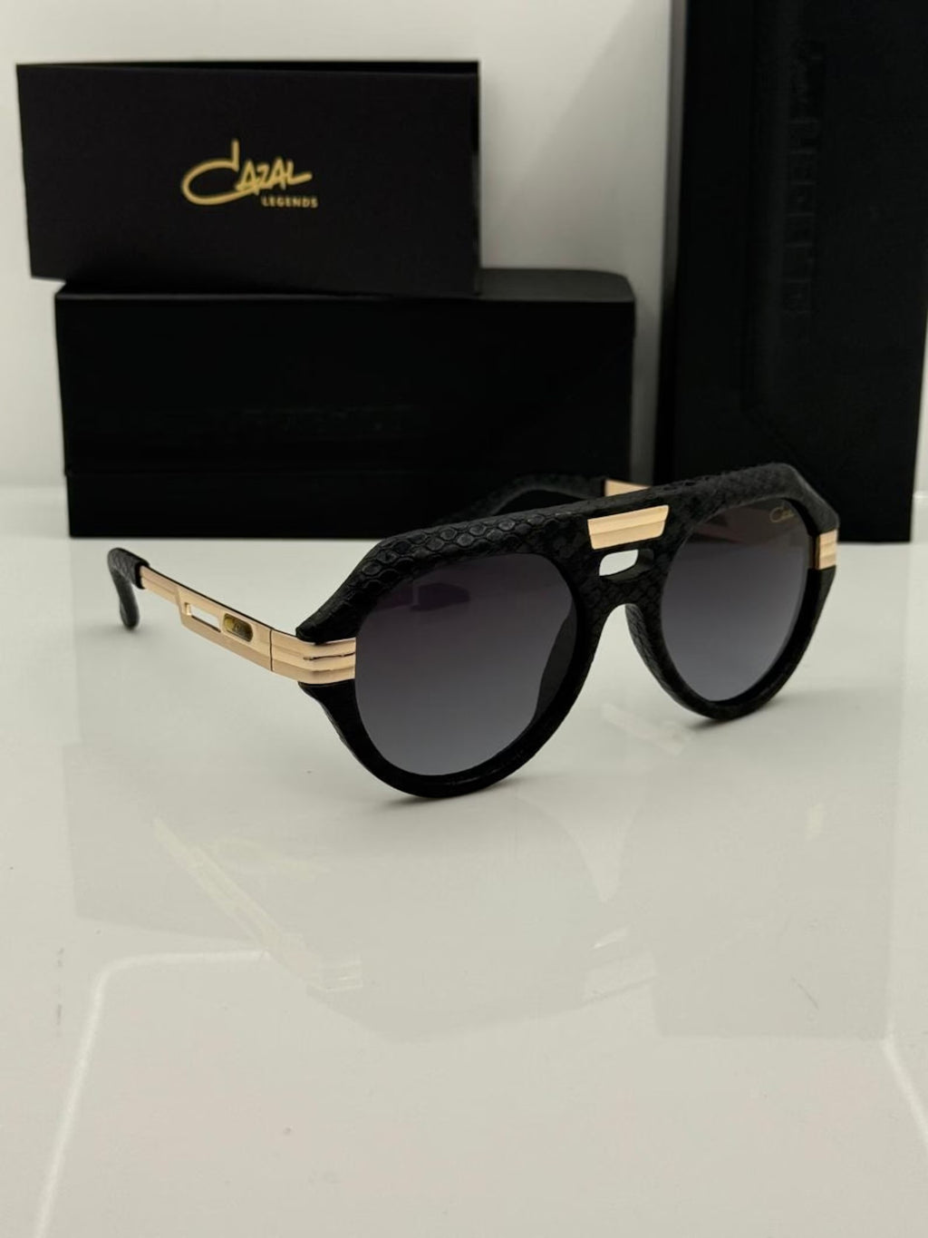 Cazal Glasses Legends 657 Black Leather Snakeskin Bridge Transparent Golden Sunglasses