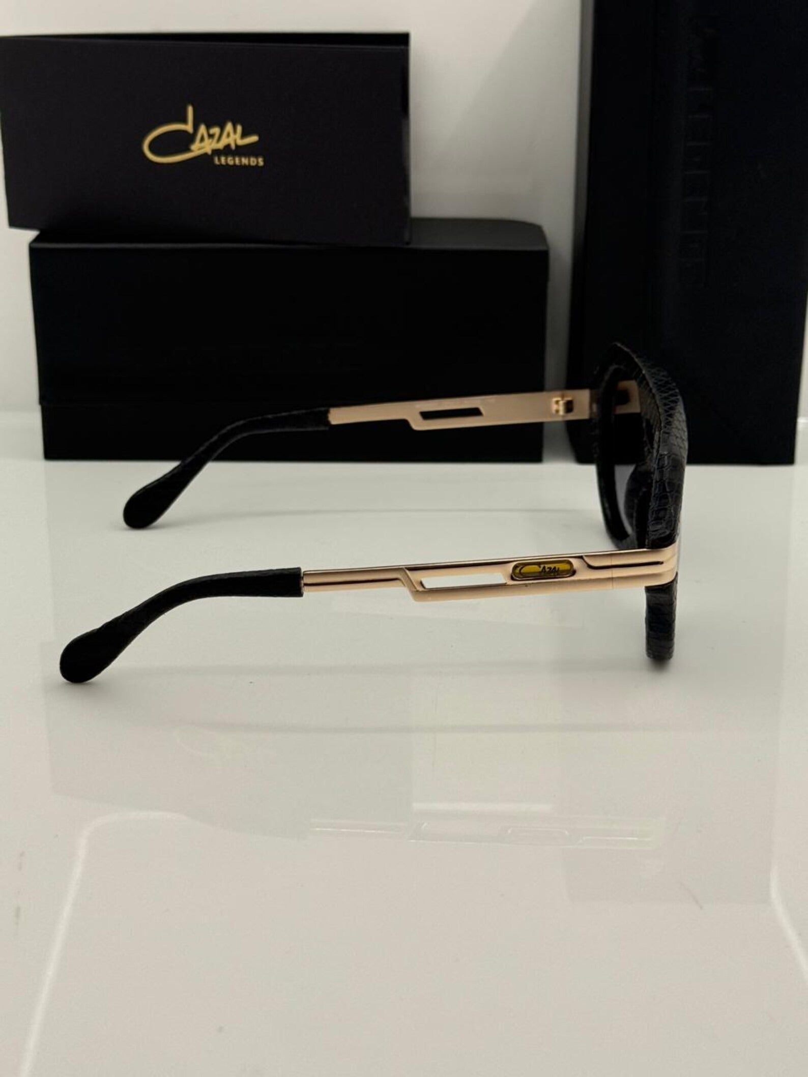 Cazal Glasses Legends 657 Black Leather Snakeskin Bridge Transparent Golden Sunglasses