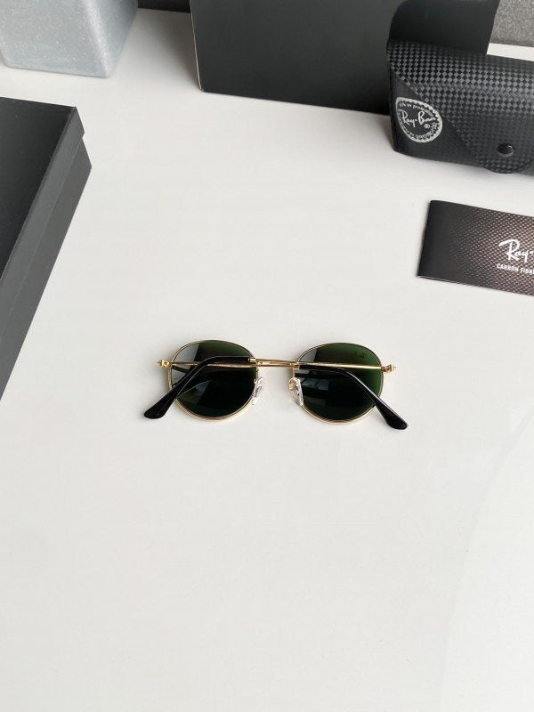 Rayban gold green 3447