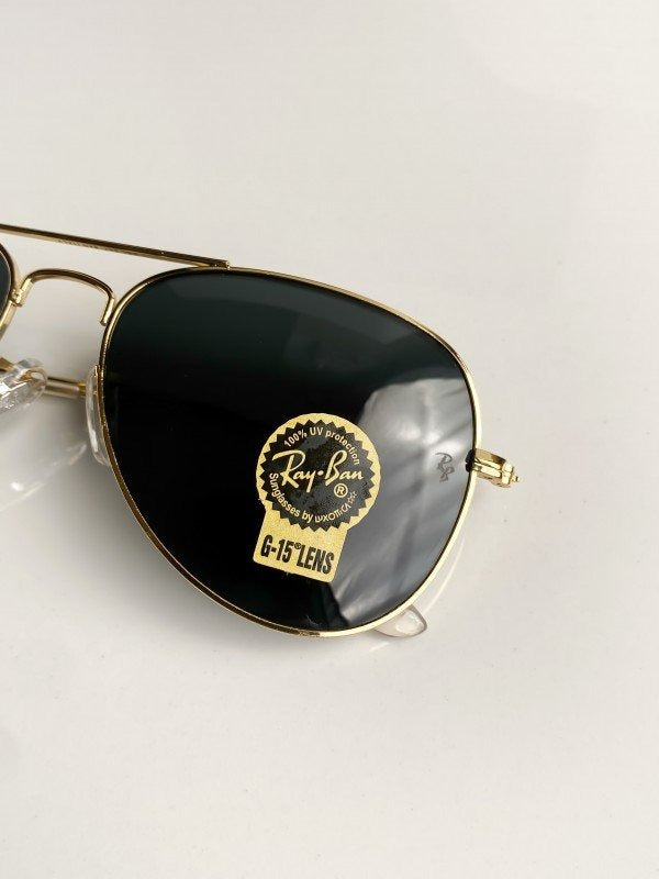 Rayban gold black 3026