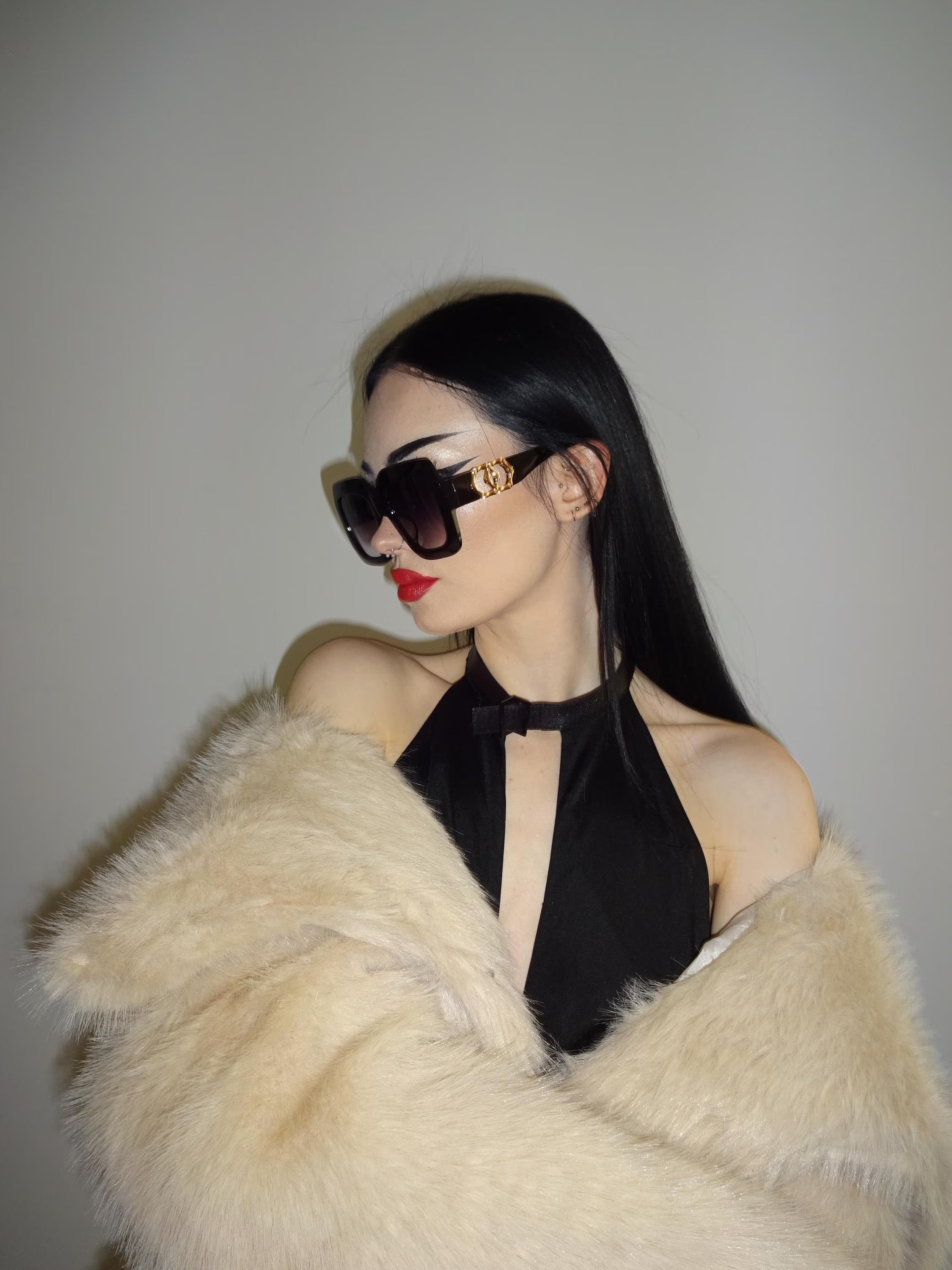 The ''Gold trim square shape Jackie O'' oversized sunglasses