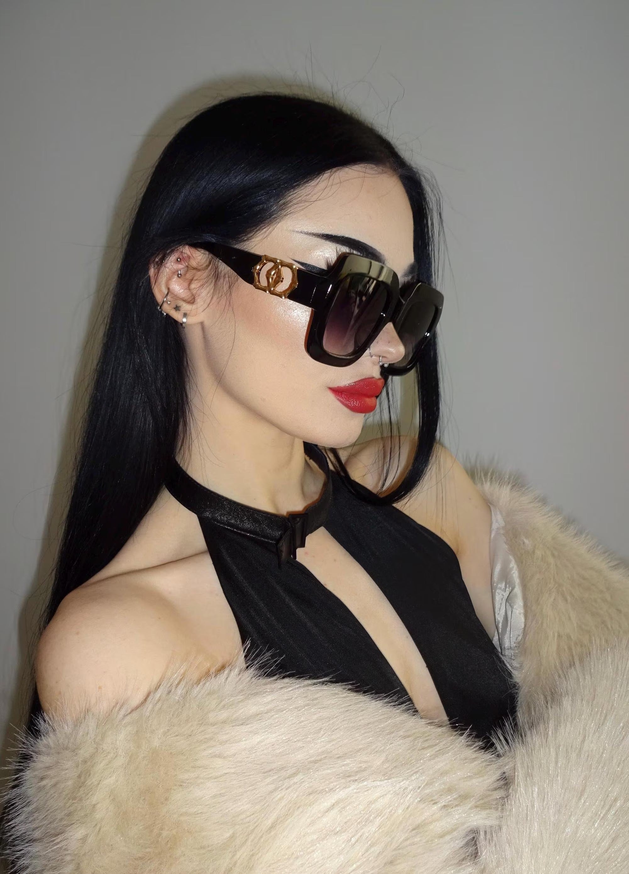 The ''Gold trim square shape Jackie O'' oversized sunglasses